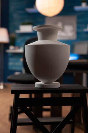 Closeup of empty drawing art studio with nobody in it ready for painting course equipped with professional sketching tools. Modern atelier with vase on chair used to create artwork masterpiece.の写真素材