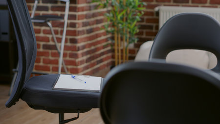 Close up of chairs in circle used for aa group meeting with people and therapist. Office with furniture designed for therapy session against alcoholism and drug addiction. Rehab spaceの写真素材