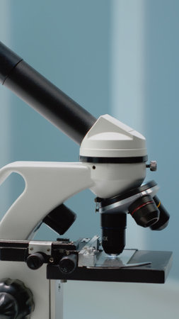 Scientific microscope in professional research laboratory on desk. Close up of magnifying glass...