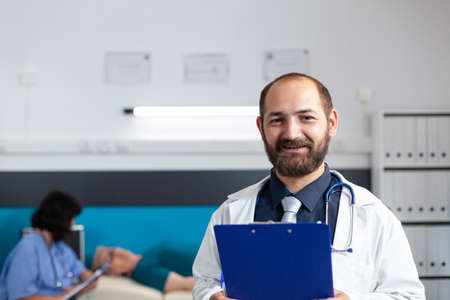 Portrait of orthopedic doctor working to help with recovery. Healthcare specialist looking at camera...