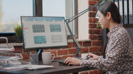 Close up of woman working with stock market exchange to buy and sell crypto currency on computer....