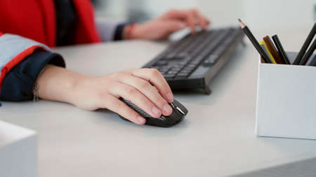 Marketing consultant working on computer to plan business growth, using modern technology to create...
