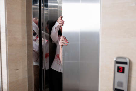 Couple of angry zombies escaping elevator, attacking startup office to attack people with horrific...