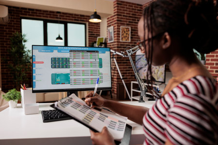 Woman analyzing statistics on computer screen, working with internet of things, using online application for work. Remote worker monitoring data, web 3 0, iot technology conceptの写真素材