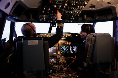 Airliners team flying airplane with dashboard command, using control panel and navigation...