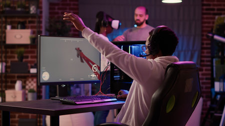 Gamer playing online action game testing motion sensors while gaming couple is setting up virtual...