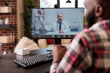 Adult talking to medic on telehealth videocall, using telemedicine videoconference with webcam to...