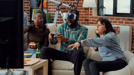 Multiethnic group of people losing video games with virtual reality headset, plying online...