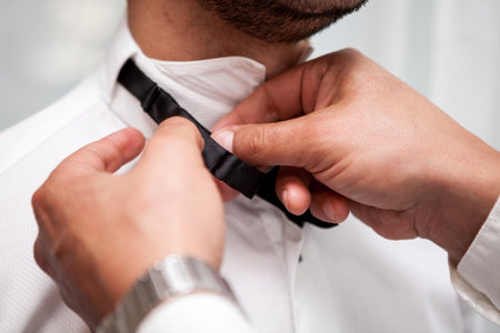 Groom in his weeding day in preparation. Celebration and weddingの写真素材
