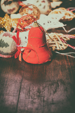 Decoration in vintage toning on wooden background. Xmas ornamentsの写真素材
