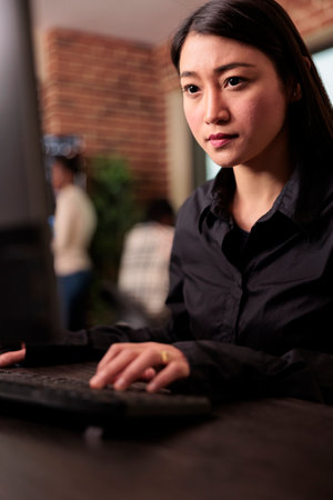 System engineer working on programming project for the company data center, focusing on process of developing software. Freelance coder working on cyber security innovation in it agency.の写真素材