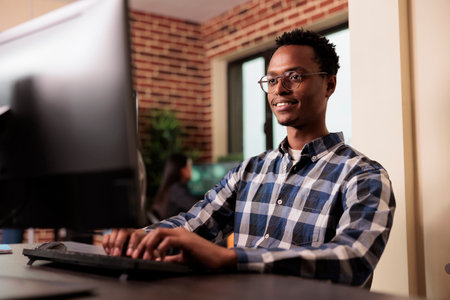 Software developer working on software program in it programming agency, utilizing skills in coding and technology to create more inclusive program. System engineer writing html scriptの写真素材