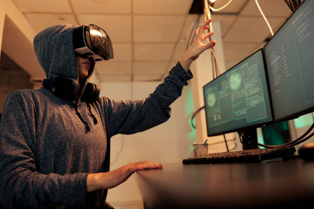 Thief hacking database in metaverse and coding spyware with vr glasses at night, stealing electronic...