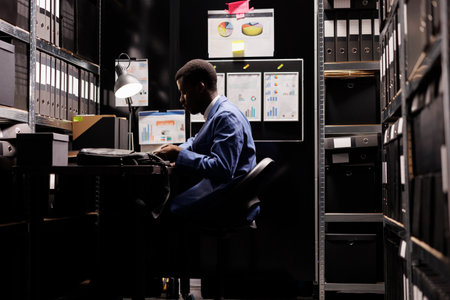 Bookkeeper analyzing accountancy report,の写真素材