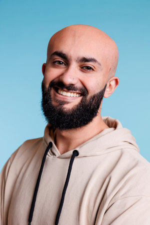 Smiling young arab man portrait