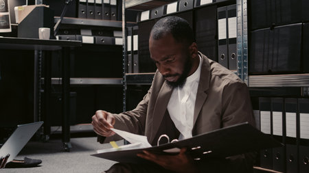 Team of private detectives using case files to find suspect
