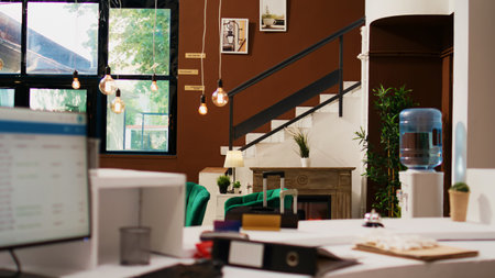 Empty reception front desk and lobby with interior design and luxurious furniture, classy hotel lounge area and counter. Tropical seaside resort with modern decorations, marble floor.の写真素材