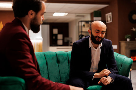 Executive manager present innovative concepts during international business conference. Entrepreneurs travelling for work in formalwear, reflecting professionalism and dedication at hotel.の写真素材