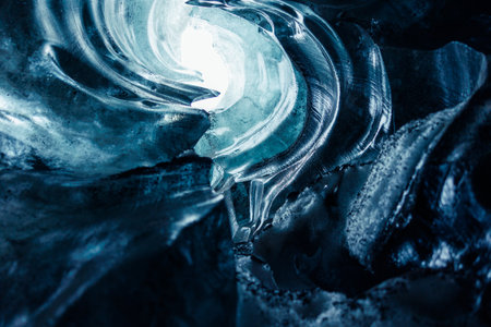 Huge rocks of ice inside vatnajokull glacier crevasse in icelandic landscapes, majestic transparent...