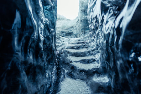 Amazing ice rocks in vatnajokull caves, transparent blue blocks of ice melting after climate change....