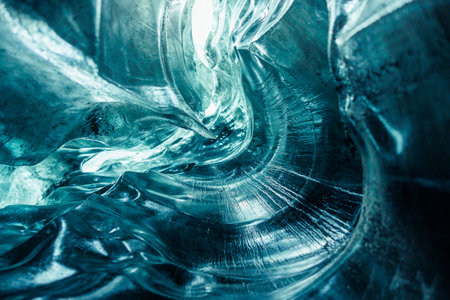 Ice pathways with visibly shattered icebergs at Vatnajokull glacier. Ice crevasse tunnel with icy blocks used for glacier hiking among gorgeous blue chunks of ice in arctic location.の写真素材