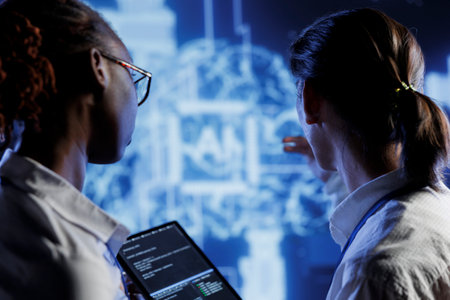 IT consultants brainstorm ways to use AI cognitive computing to extract usable information from...