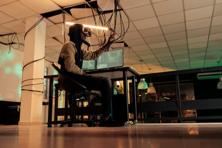 Hacker breaking into computer system in vr glasses, hacking database, spyware coding simulation....