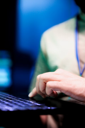 Close up view of laptop keyboard being used for working with datasets and machine learning models...