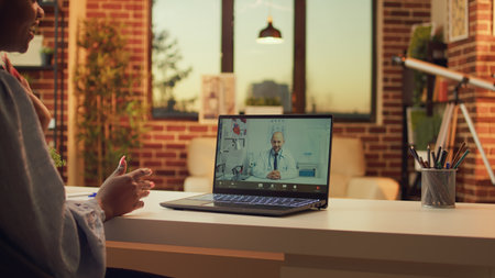 Person using telemedicine videocall with doctor asking for medical counselling and advice from home...