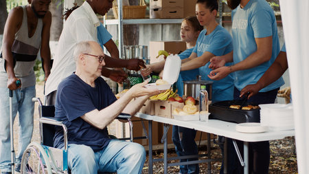 The needy are helped and fed by charitable group, and homeless people are given free food, including...