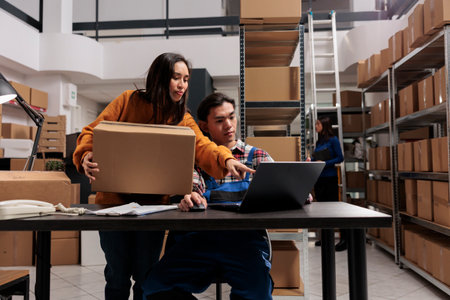 Shipment service workers managing parcel receiving and sending operations in post office storage...