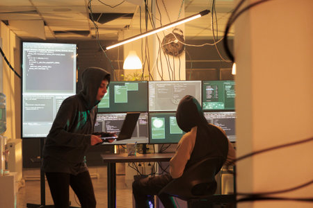 Hackers coding spyware, cracking database password, getting illegal access, data breach. Cybercrime,...