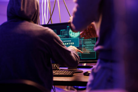 Criminals hacking computer network system successfully and getting access granted message on screen....