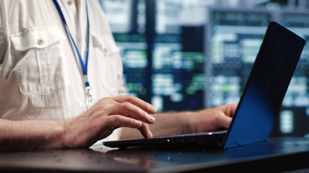 Certified IT admin expertly managing data while navigating in industrial server room. Trained...