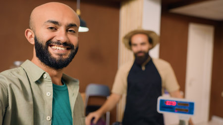 POV of client advertising organic farming at zero waste supermarket with locally grown fruits and veggies, filming video of owner selling his freshly harvested products. Eco friendly.の写真素材