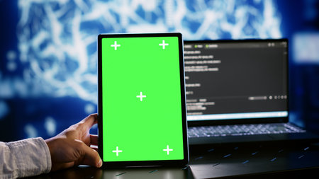 Certified admin using chroma key tablet to write artificial intelligence script code in startup...