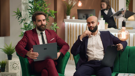 POV business managers on online videocall meeting with investors to pitch new solution, looking to obtain funds. Associates attend telework conference for briefing session. Tripod shot.の写真素材