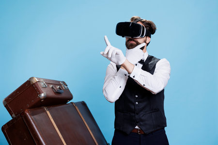 Doorman employee uses vr glasses on camera and posing next to pile of suitcases, having fun with...