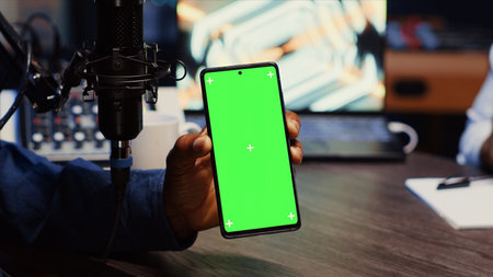 Isolated screen smartphone hold by presenter on podcast discussing with guest during marathon stream...