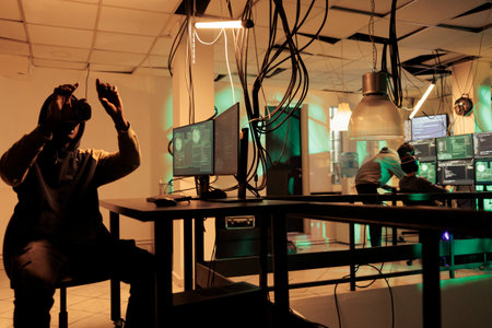Criminal programming computer virus program in vr helmet, cracking database password in metaverse, online server hacking simulation. Cybercrime, hacker coding malware in virtual realityの写真素材
