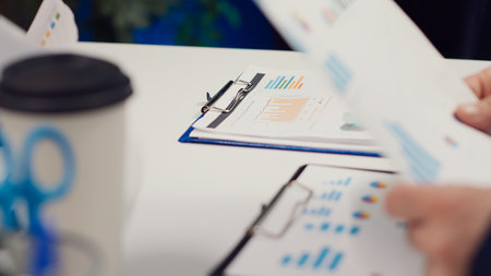 Executive team sharing information and updates on project details, briefing session to catch colleagues up to speed. Coworkers develop internal communication strategies to ensure success. Camera A.の写真素材