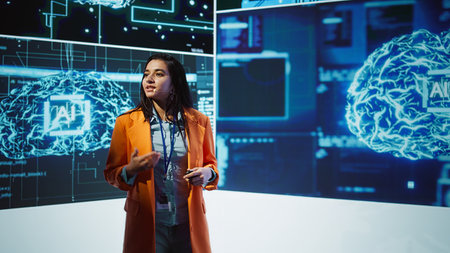 AI specialist showcasing cutting edge technologies, sharing industry knowledge. Speaker from across various industries come together to discuss latest developments in AI and Big Data, camera Bの写真素材