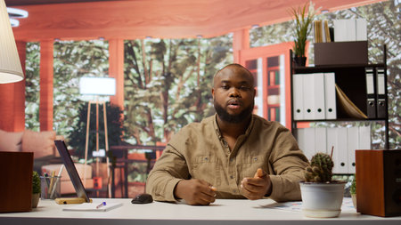 Entrepreneur presenting development strategies and funding plans to shareholders on remote conference call, using data to ensure economic growth. Businessman discussing with investors. Camera B.の写真素材