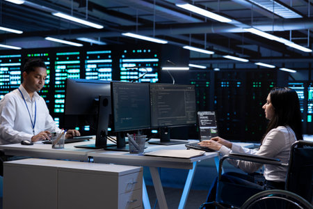 Person with disability and coworker in inclusive server room facility ensuring data remains shielded...