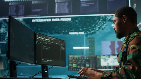 IT expert monitors AI brain intelligence system to collect crucial real time data for a new defense...