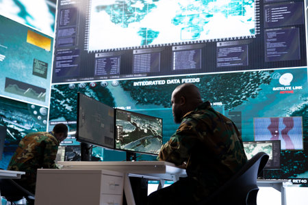 Army intelligence officers use modern computer systems and satellite data to bolster national...