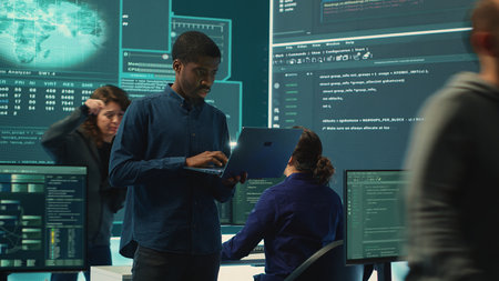 Group of governmental hackers analyzing digital threats on pc networks, using a big screen....