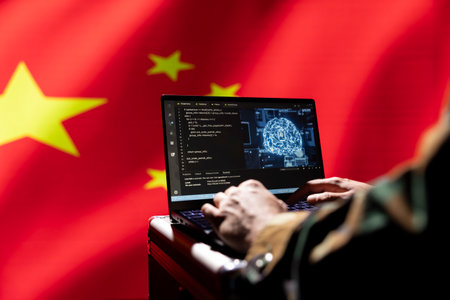 AI software on laptop used by Chinese security services to prevent terrorism attacks. Artificial intelligence tech used by CCP government to defend borders, isolated over China flagの写真素材