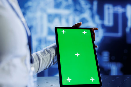 IT consultant uses green screen tablet to update neural networks, writing intricate binary code...