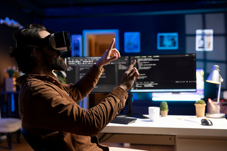 Man doing software quality assurance, reading source code using high tech VR headset. Developer inspecting coding using virtual reality technology, looking to fix potential issuesの写真素材